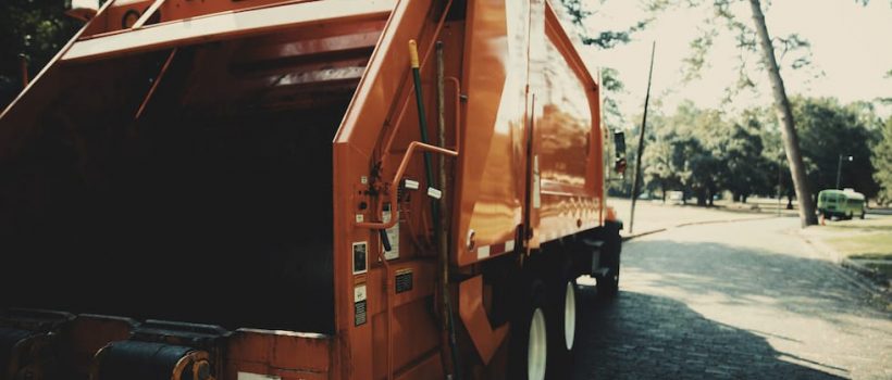 waste recycling truck driving