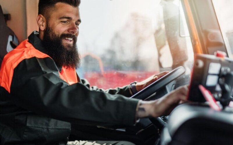 Waste truck driver using in-cab navigation